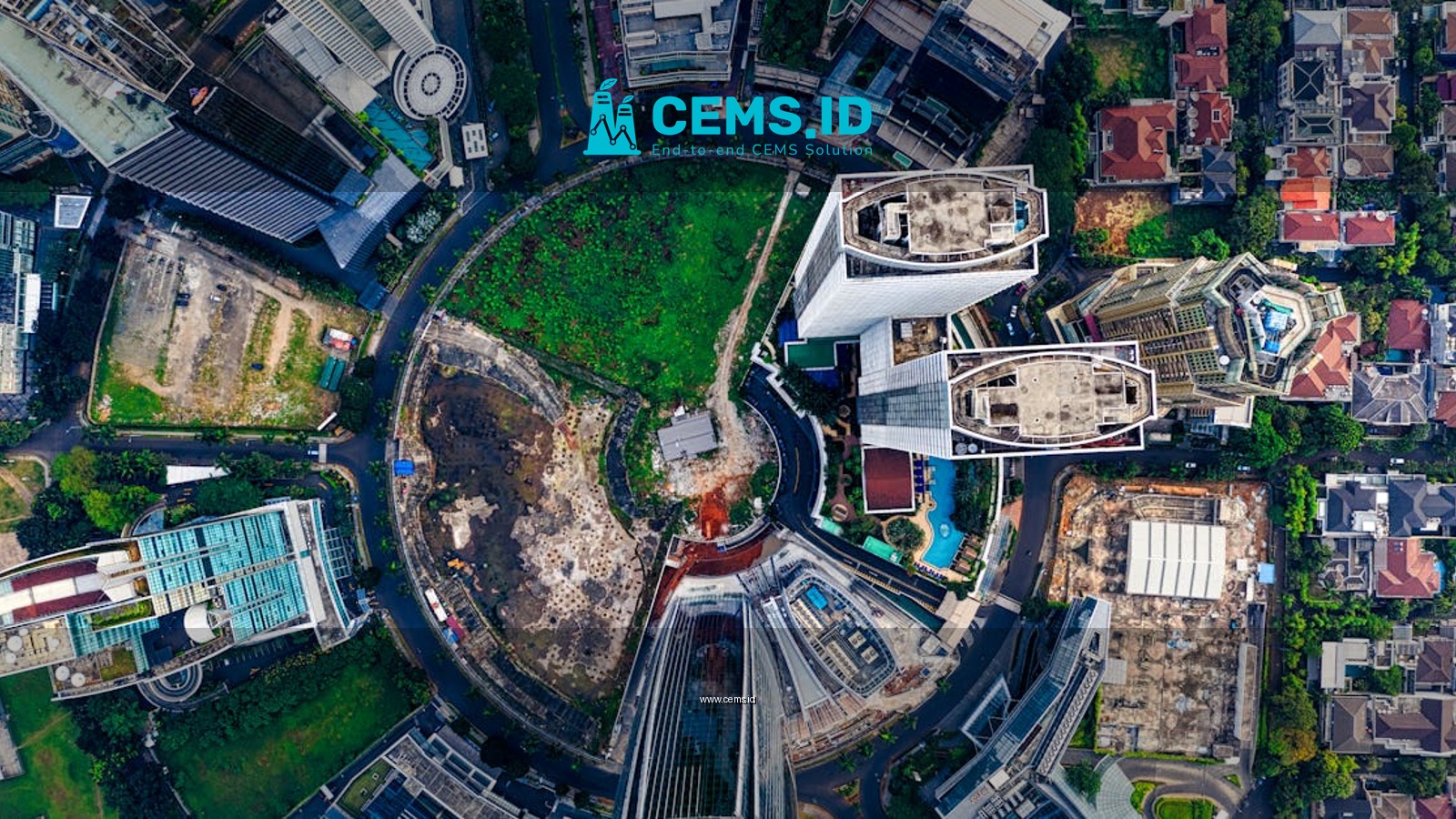 Stunning aerial view showcasing Jakarta's modern skyline and green spaces.