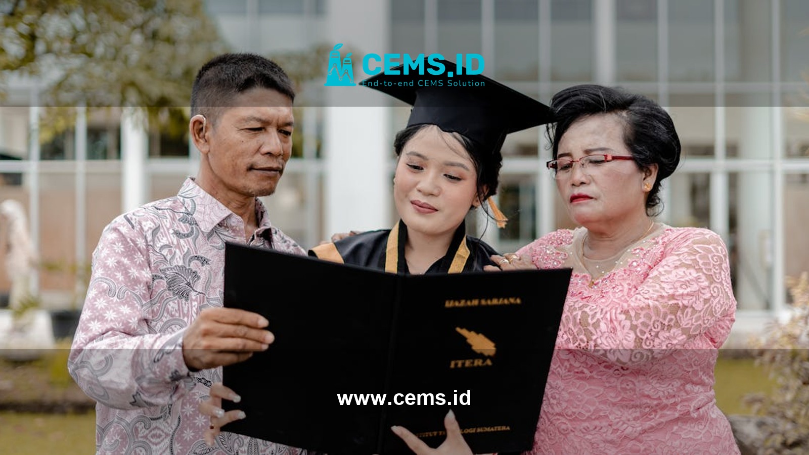 Proud family celebrates daughter's graduation with diploma in hand, captured outdoors.