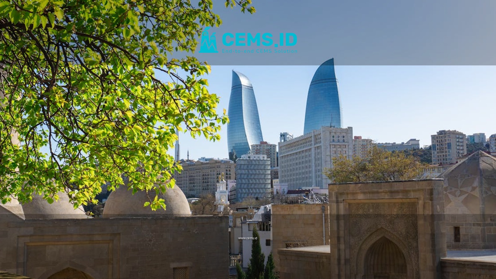 Explore Baku's modern skyline with historic architecture in spring.