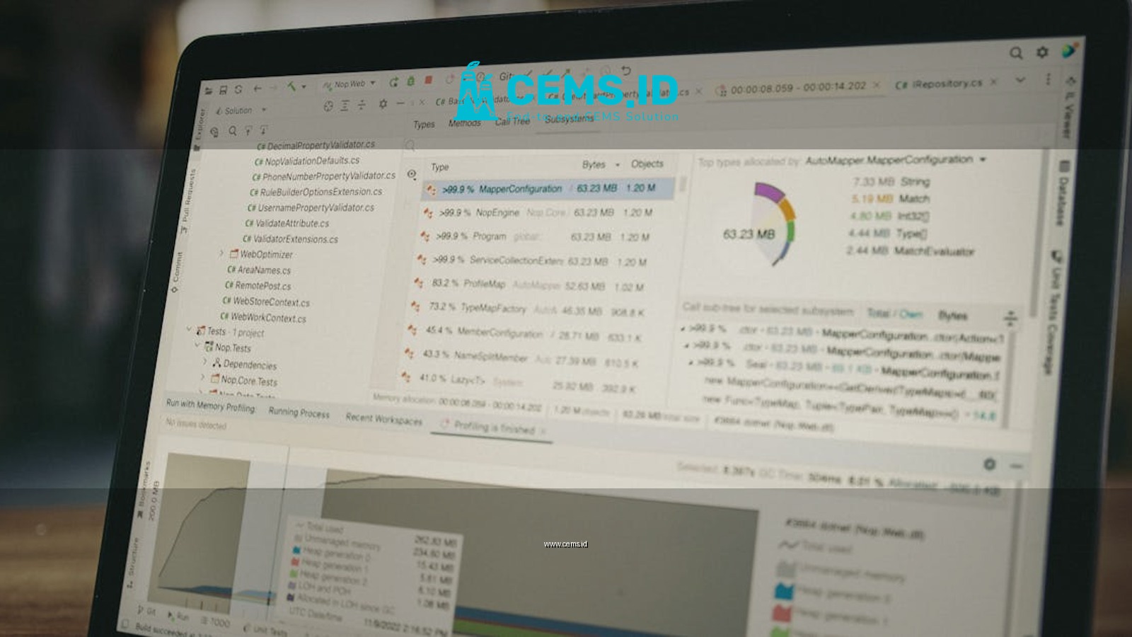 A close-up view of a laptop screen showing a coding and data analysis software interface in an indoor setting.