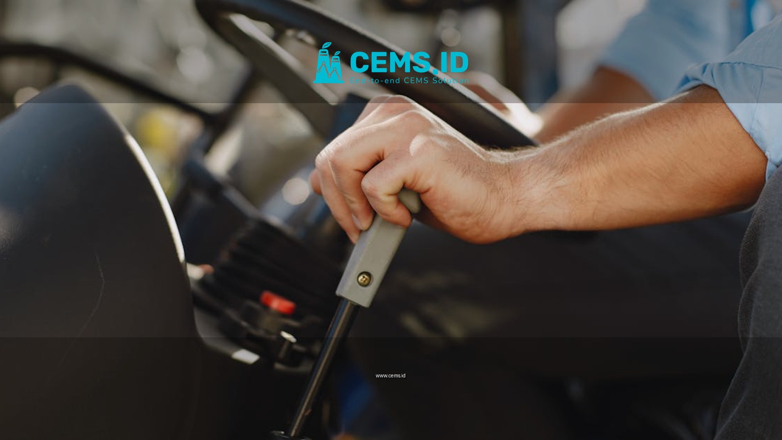 Detailed view of a man driving using the gear stick of a vehicle.