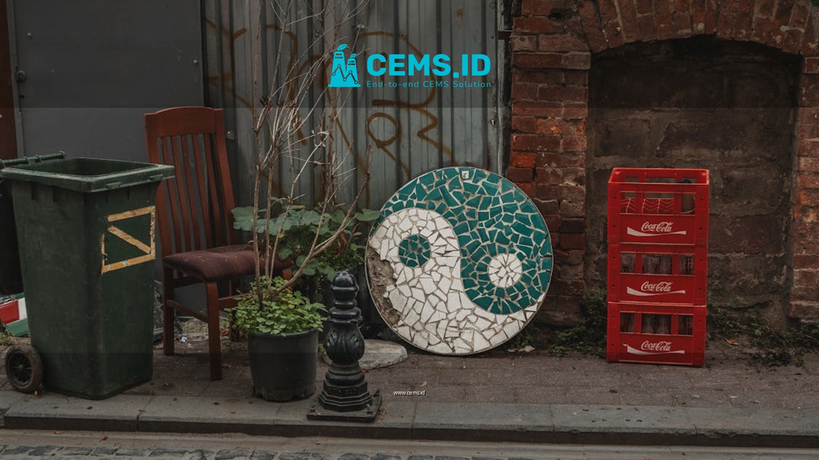 Rustic urban alley with yin-yang mosaic, Coca-Cola crates, and potted plants.