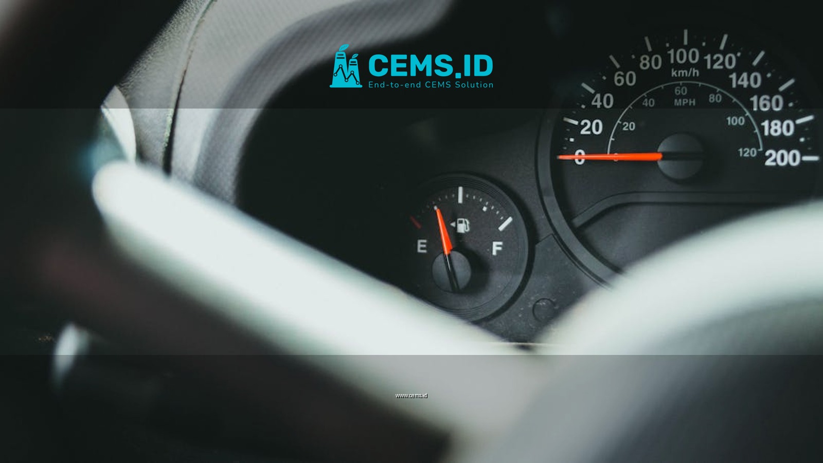 A detailed view of a car's dashboard showing the speedometer and fuel gauge indicators.