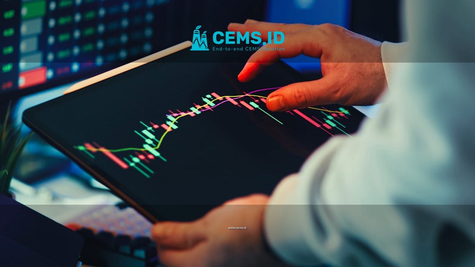 A close-up of a person using a tablet to analyze stock market trends and charts indoors.