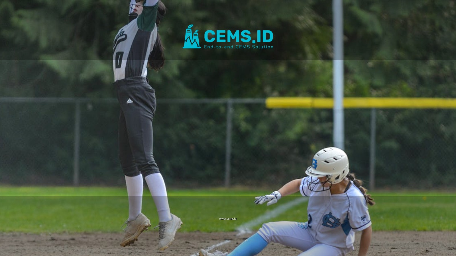 Exciting moment of a women's softball game with players in action, showcasing athletic skill and competition.