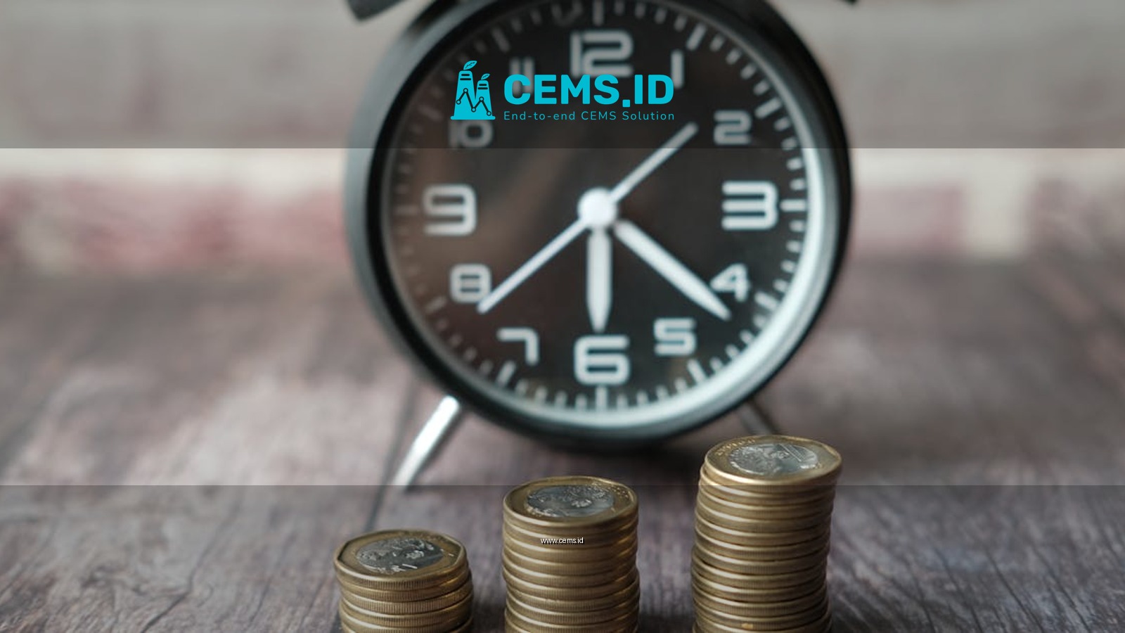 Stacked coins and a classic alarm clock symbolize the value of time and money.