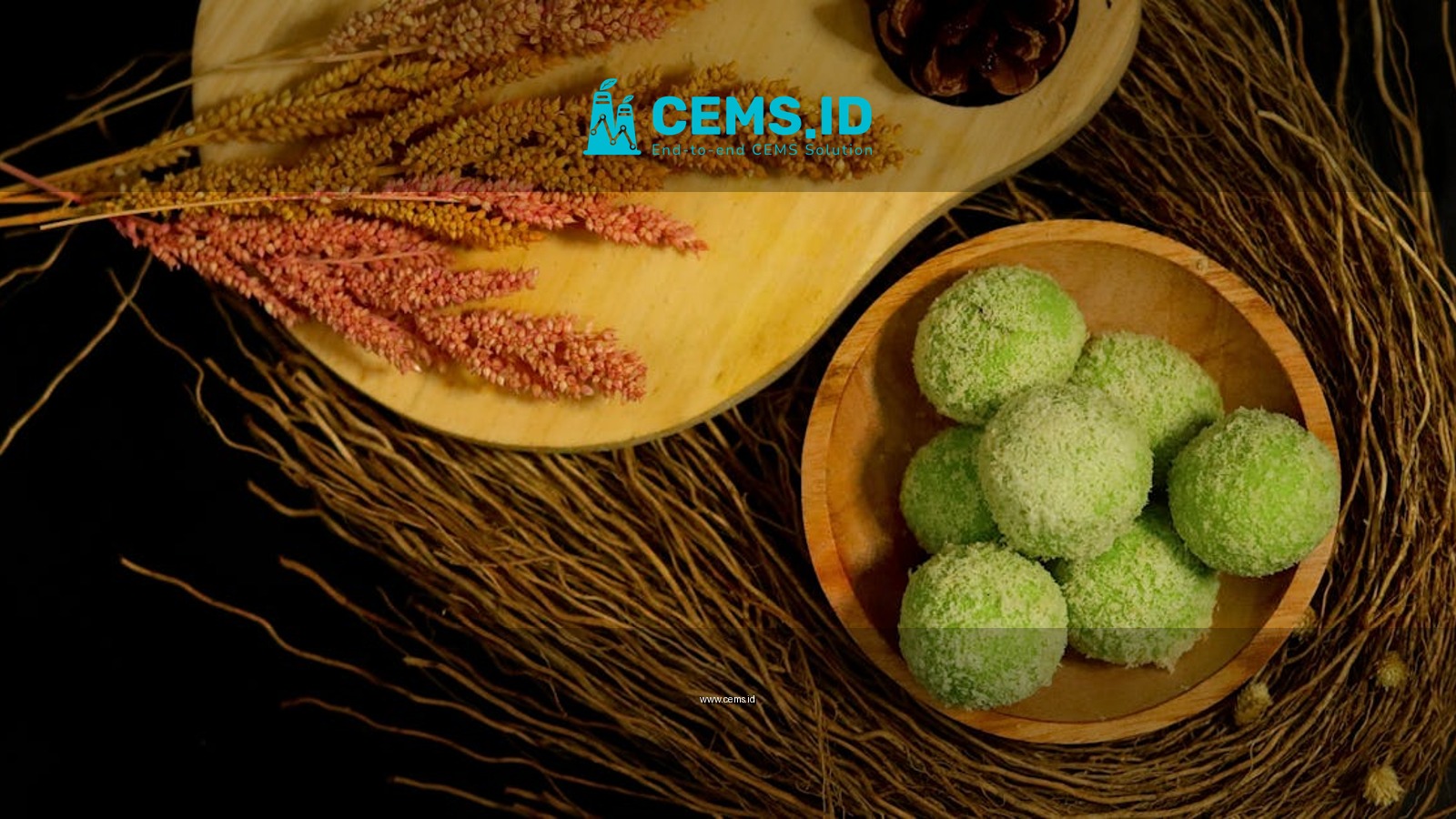 Top view of Indonesian snacks with decorative dried plants.