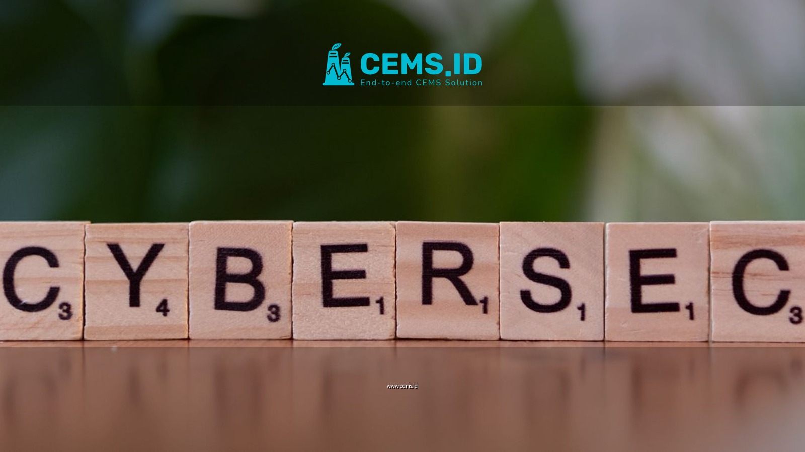 Wooden tiles spell 'CYBERSEC' against a soft-focused green background.