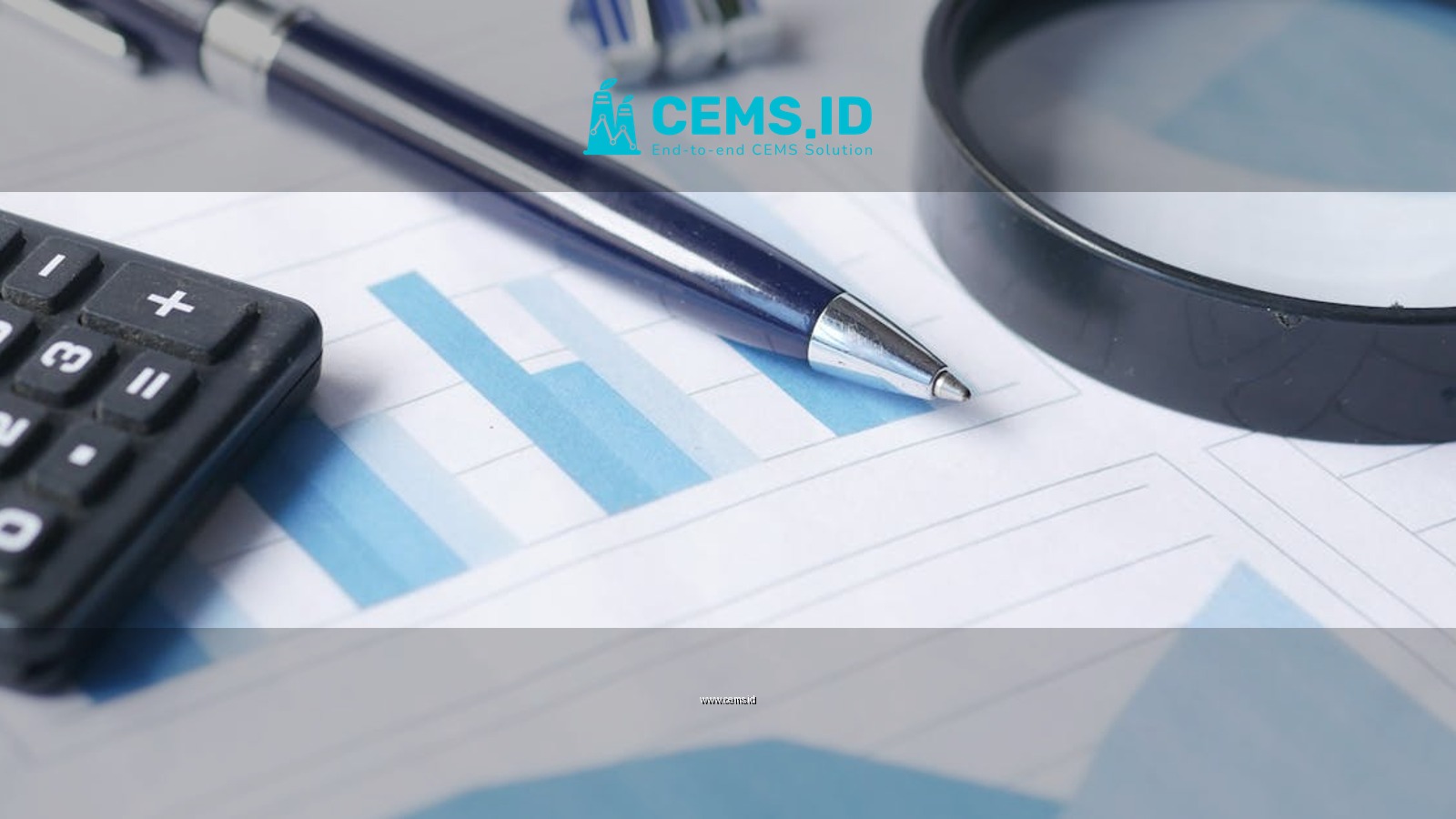 Close-up of calculator, pen, and magnifying glass on financial documents.