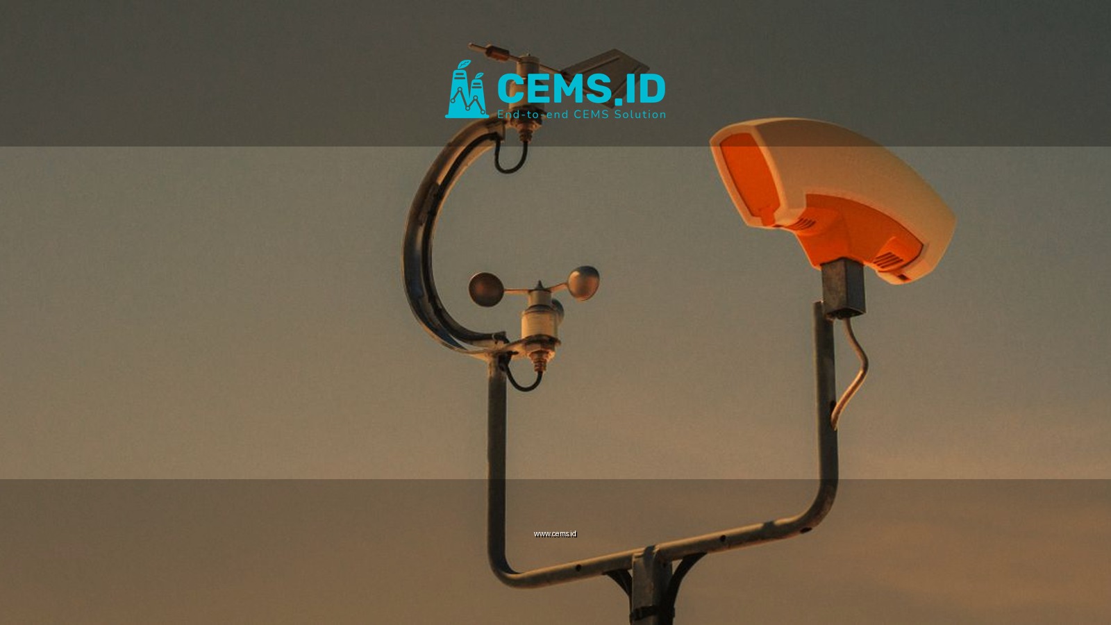 Weather monitoring equipment with a sunset sky backdrop, highlighting technology and atmosphere.