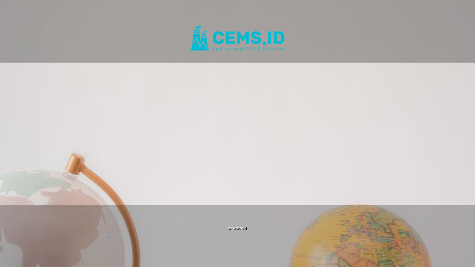 A minimalist image showcasing two globes against a light gray background offering ample copy space.