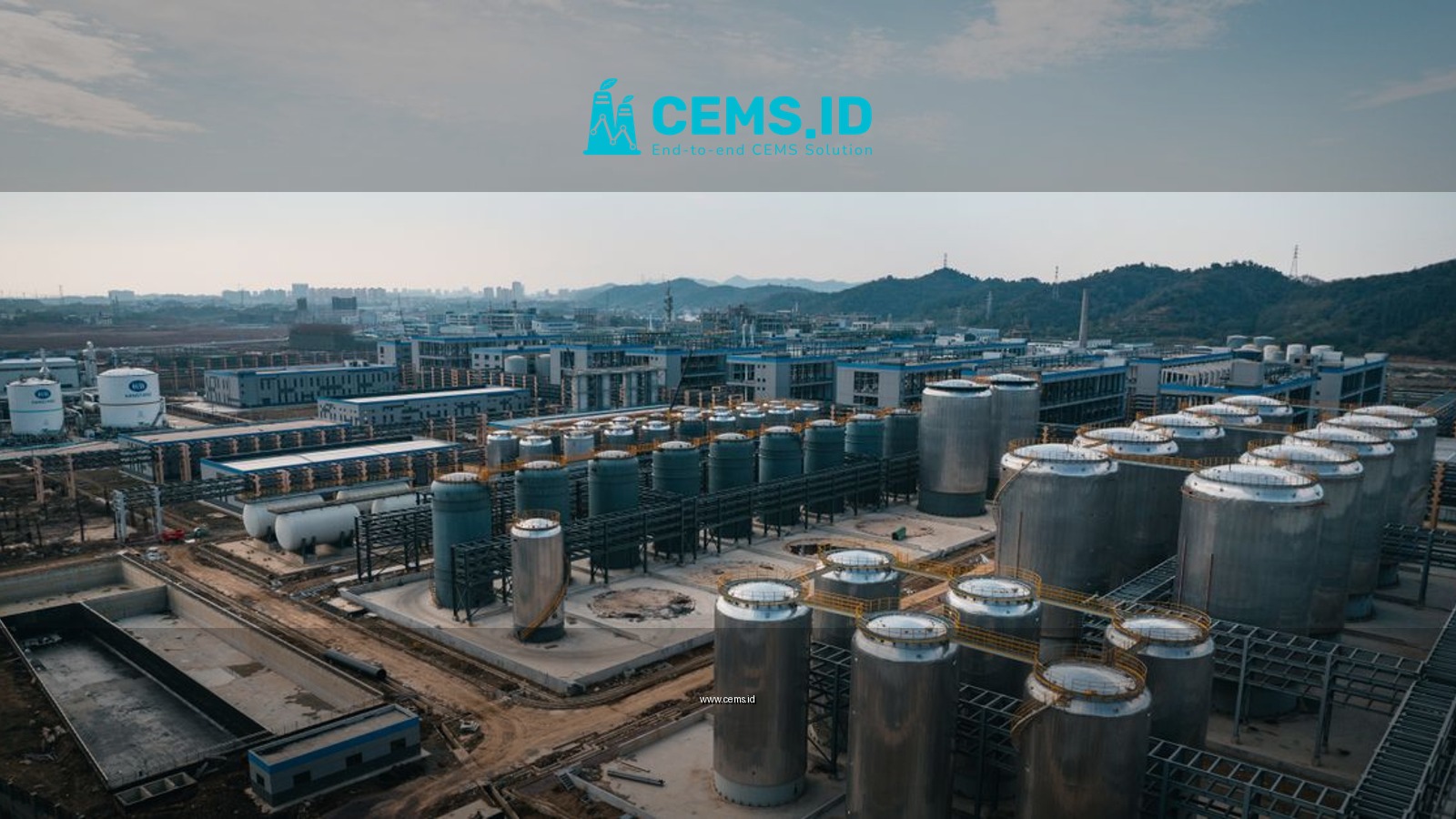 Expansive aerial view of an industrial complex with storage tanks, located in China.