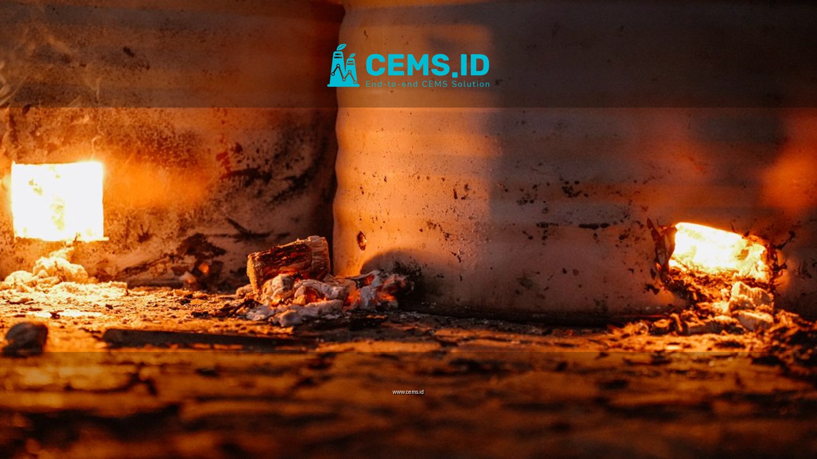 Close-up of a warm furnace fire in a rustic, industrial setting.
