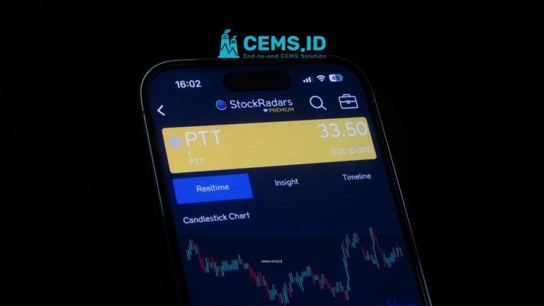 Close-up of a smartphone screen displaying a stock trading app with candlestick charts, showing real-time stock data.