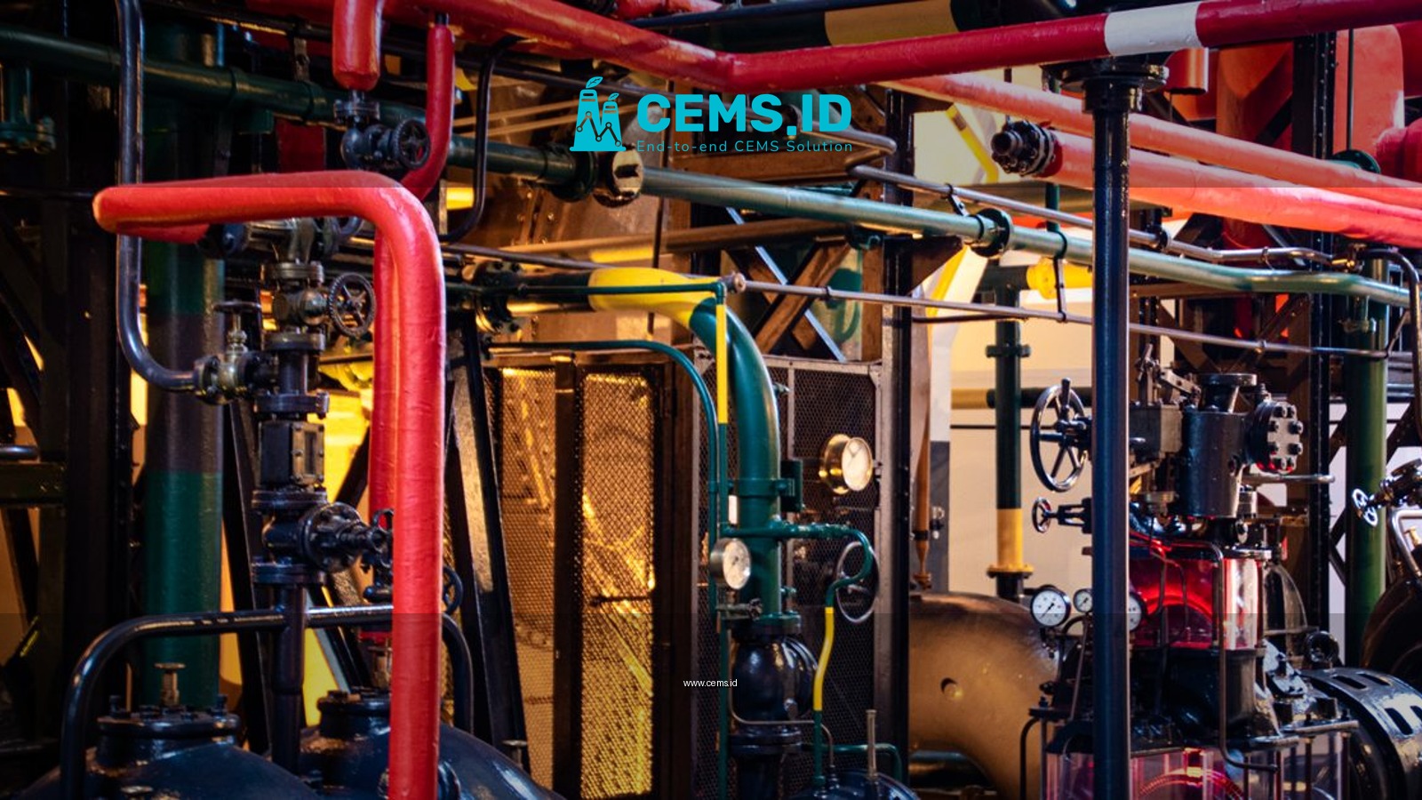 Complex network of industrial pipes and machinery inside a Lisbon plant.