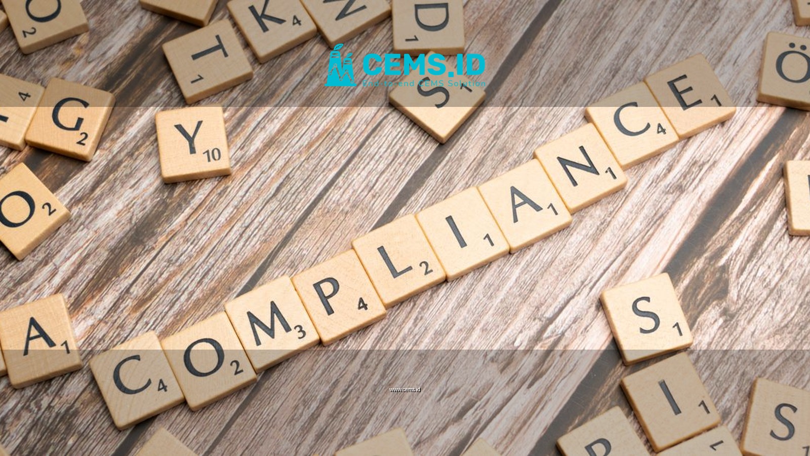 Wooden letter tiles forming the word 'COMPLIANCE' on a rustic wooden background.
