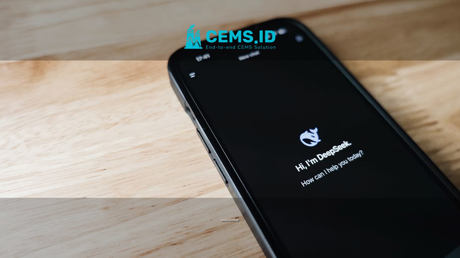 Close-up of a smartphone with DeepSeek virtual assistant on screen, placed on a wooden surface.