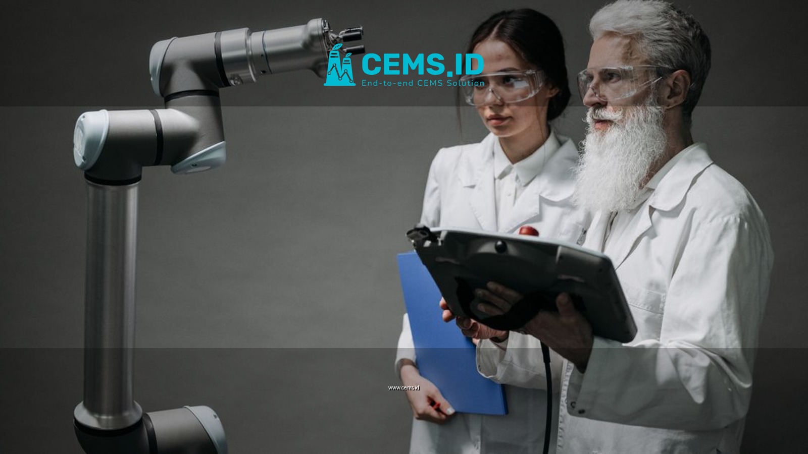 Researchers examining a robotic arm, showcasing technology and innovation.