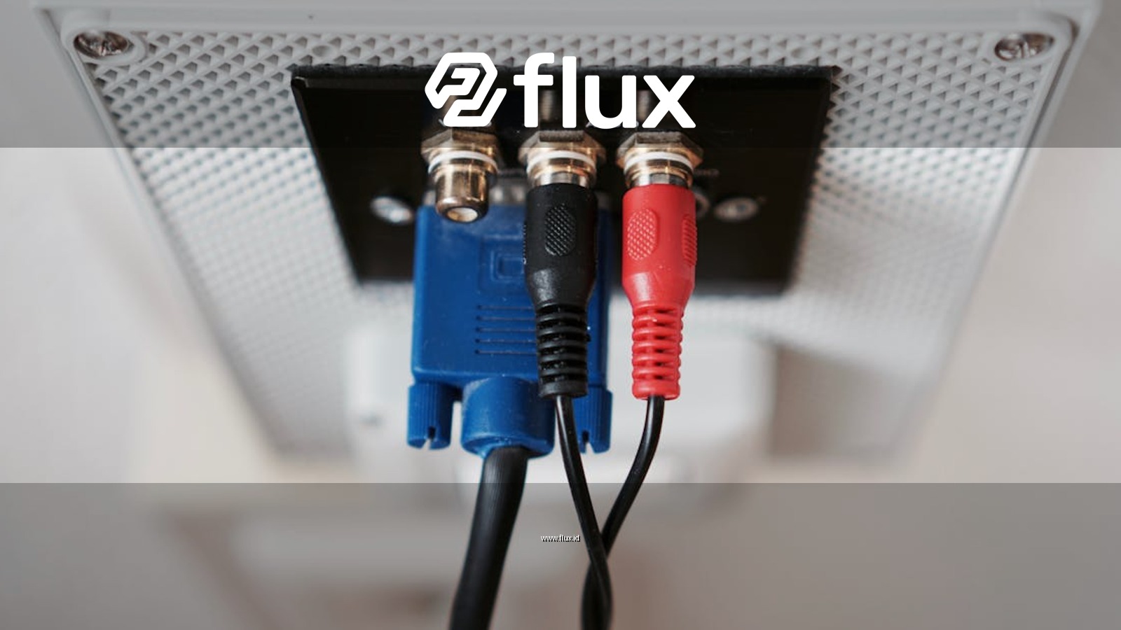 Detailed view of audio and video input cables connected to a wall socket.