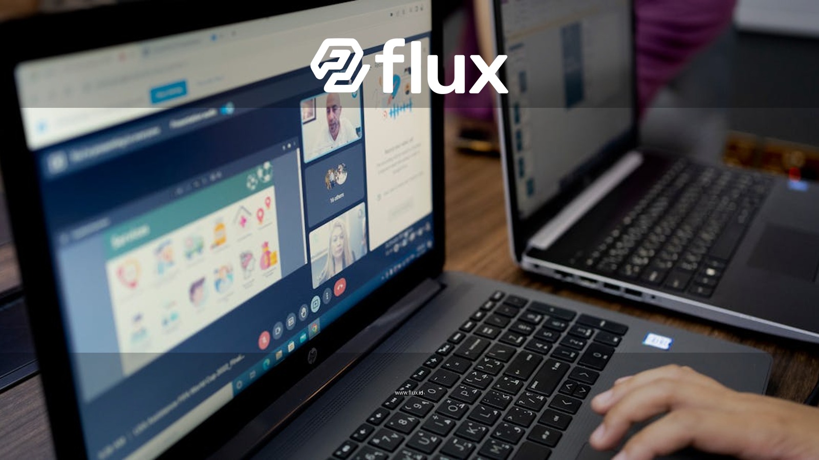Focused scene of a virtual meeting with multiple laptops and participants online