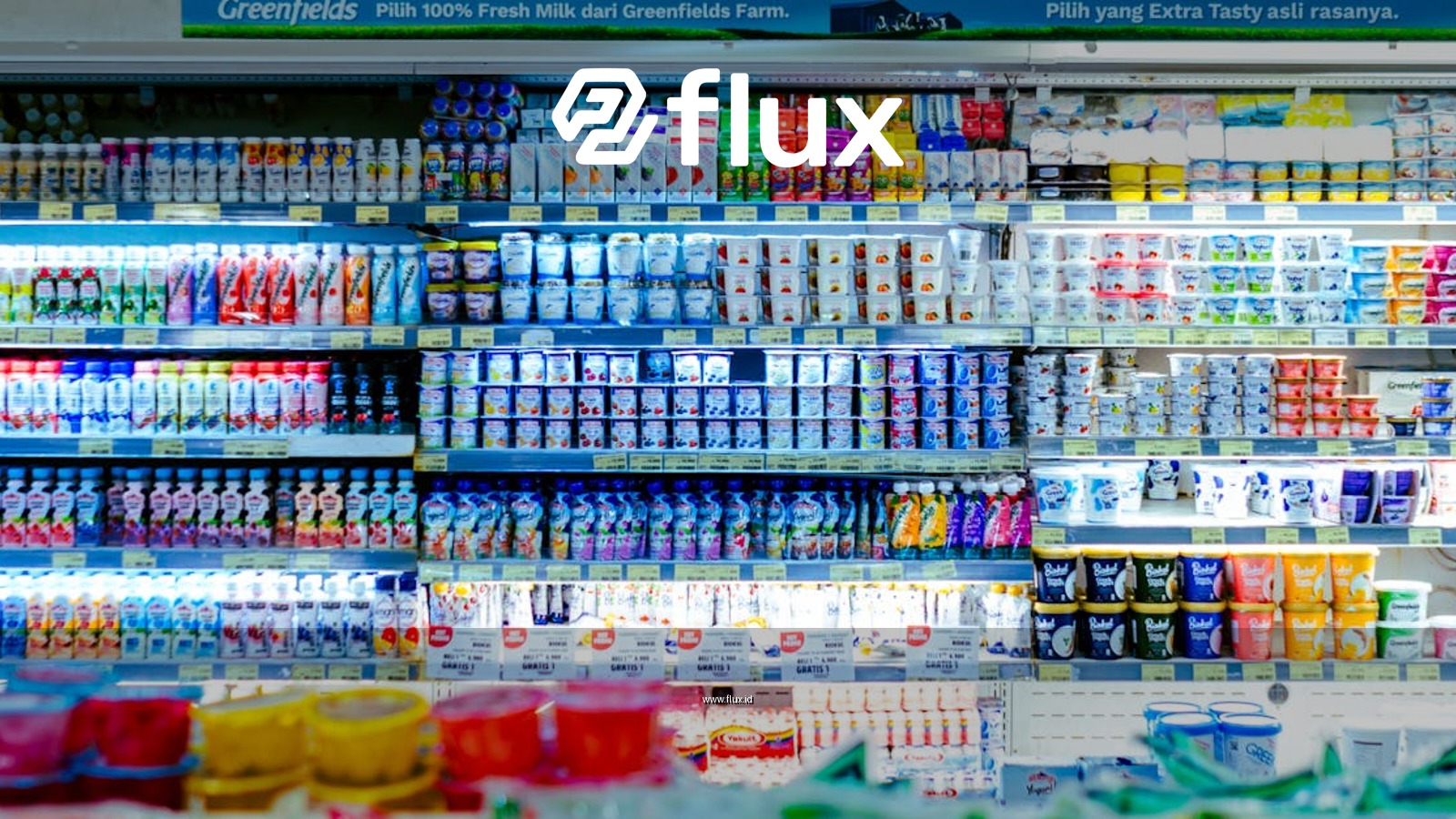 Vibrant shelves of diverse dairy products in a West Java supermarket.