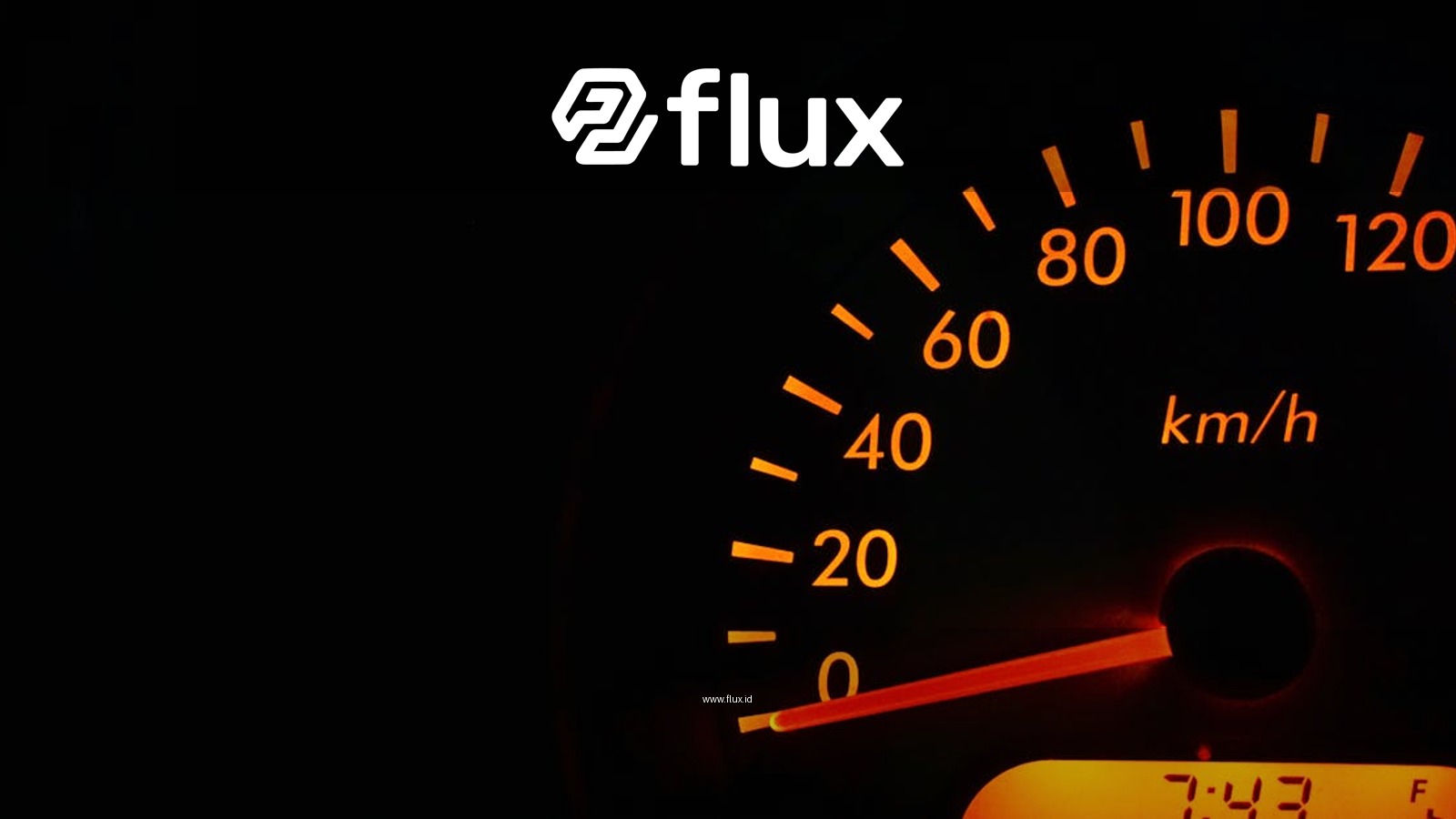 Night view of a car speedometer illuminated in orange, showing kilometers per hour.