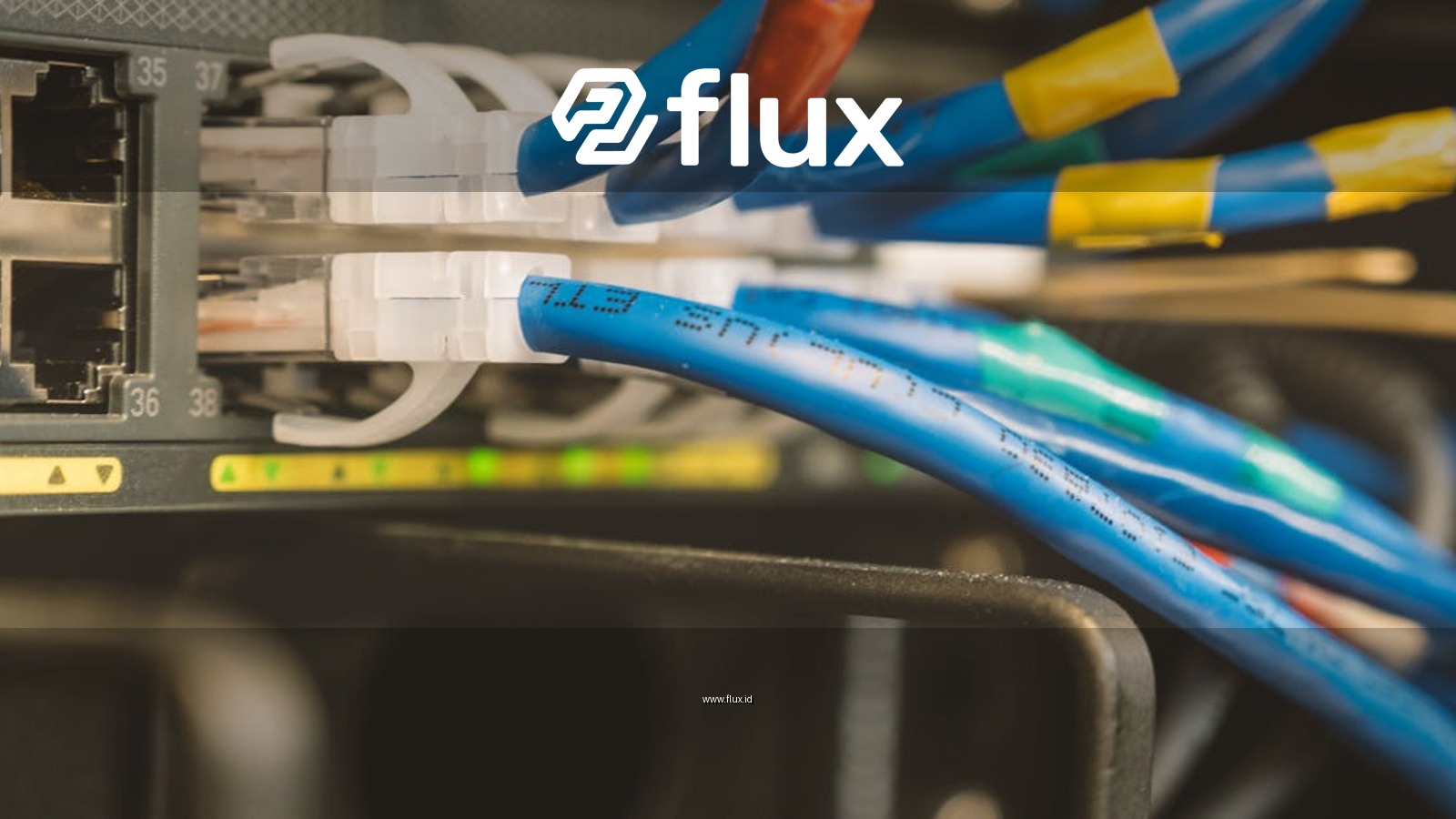 Network switch and blue ethernet cable with white tips connected to system for maintenance