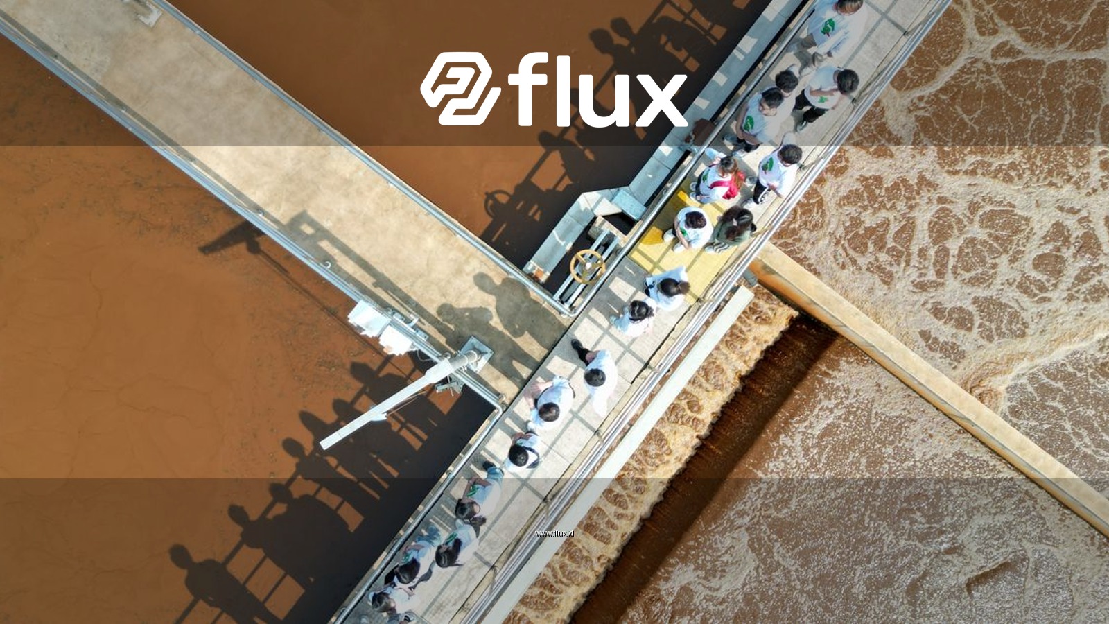 Aerial view of people touring an industrial water treatment facility in Langfang, China.