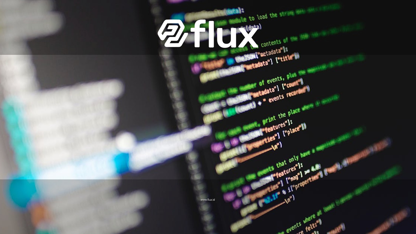 Close-up of a computer screen displaying colorful programming code in JavaScript.