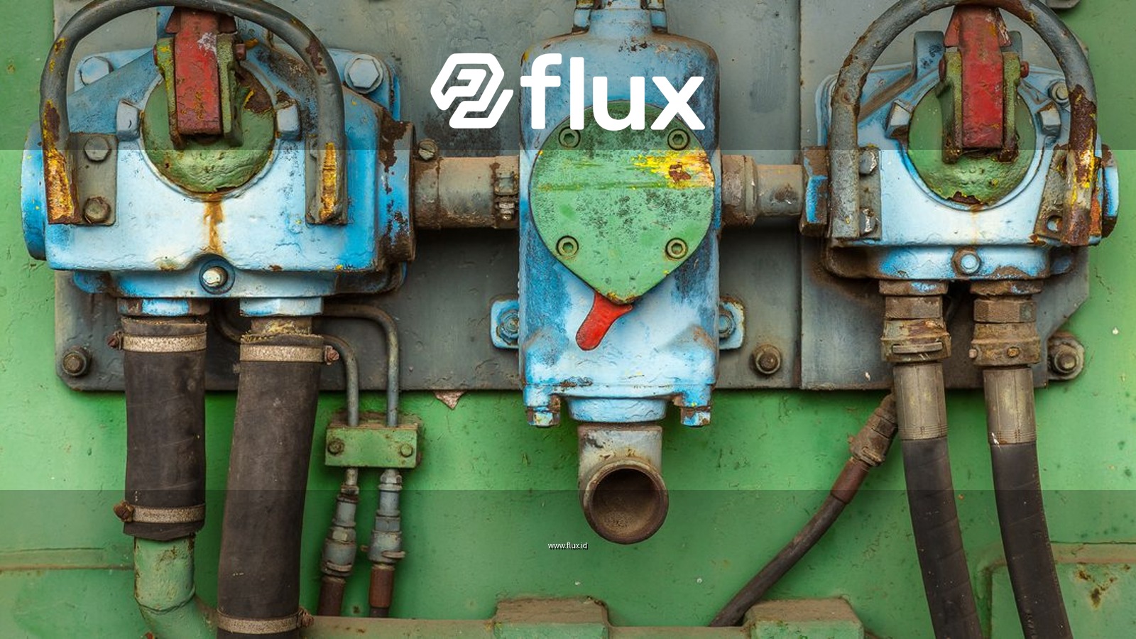 Close-up of aged and corroded industrial machinery showcasing rusty valves and pipes.