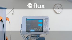 A modern heart rate monitor in a sterile hospital setting, showcasing medical technology.