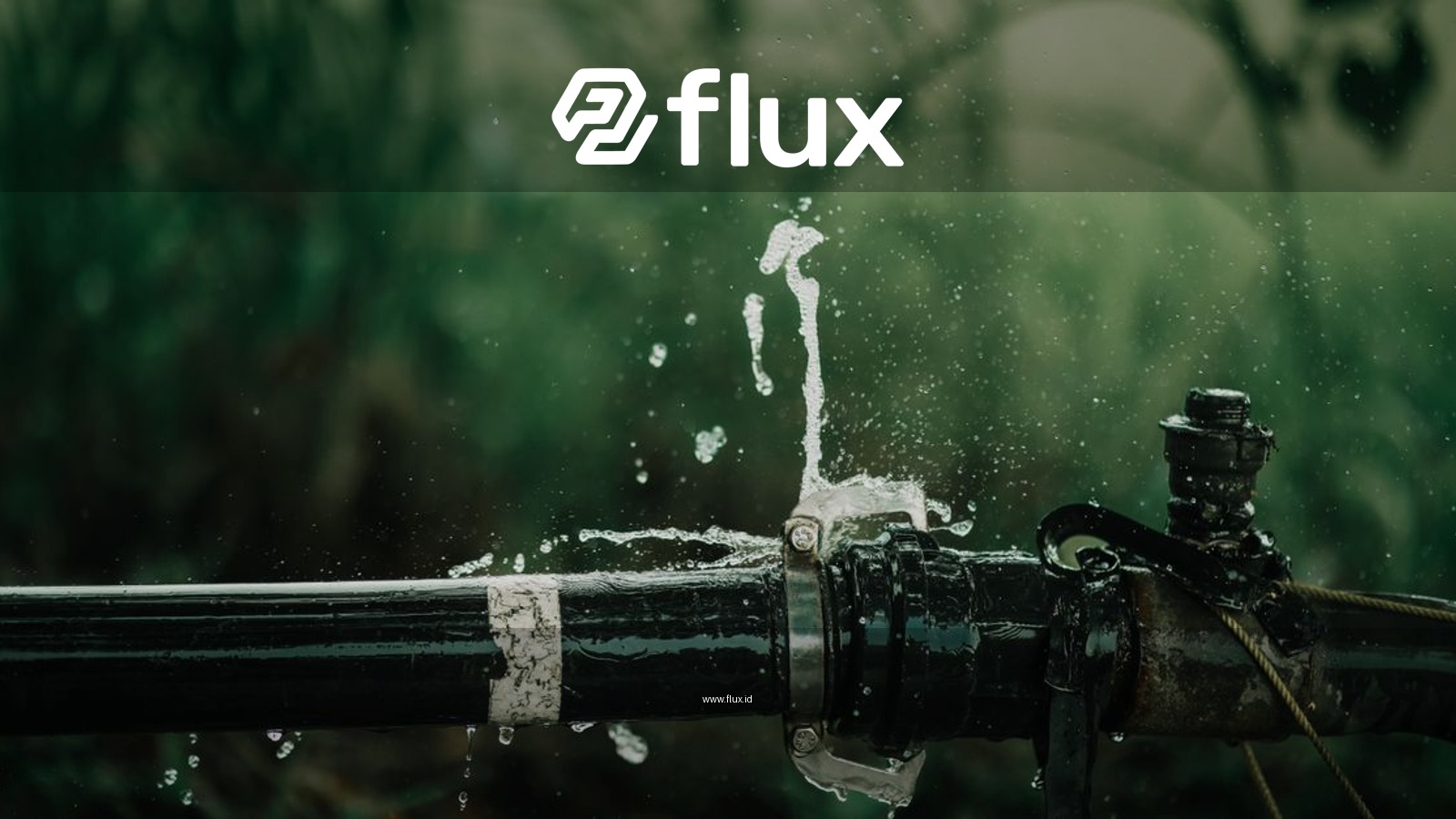 A detailed view of a leaking water pipe in a lush green garden setting.
