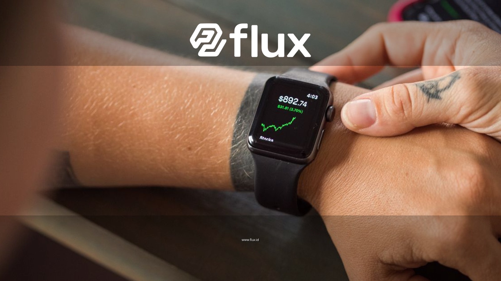 Close-up of a smartwatch showing stock market data, with hands wearing it.