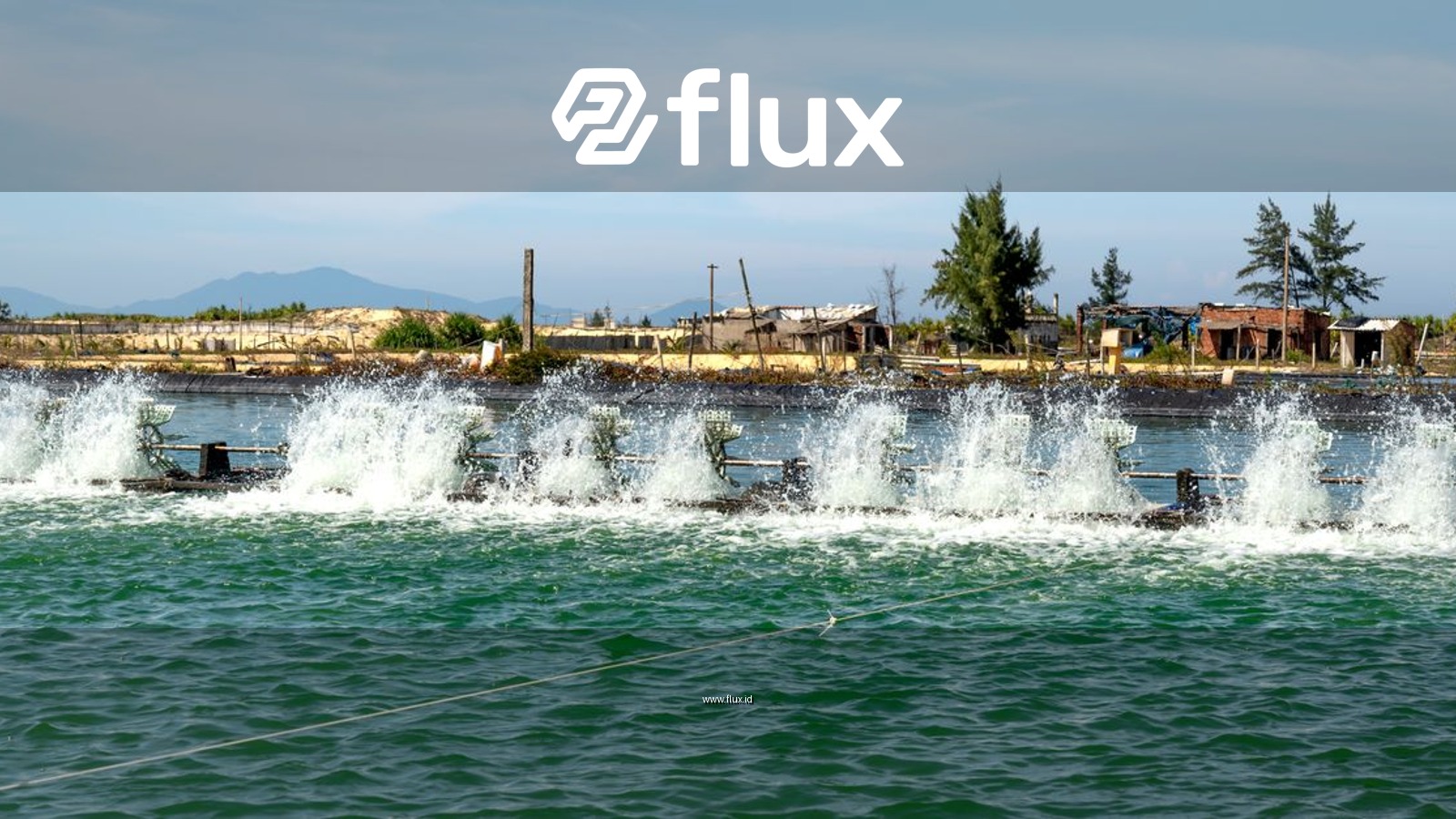 A high-powered water aerator in action at an aquaculture facility, creating a vibrant splash.