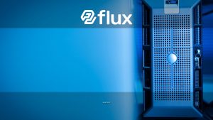 Close-up of a modern server unit in a blue-lit data center environment.