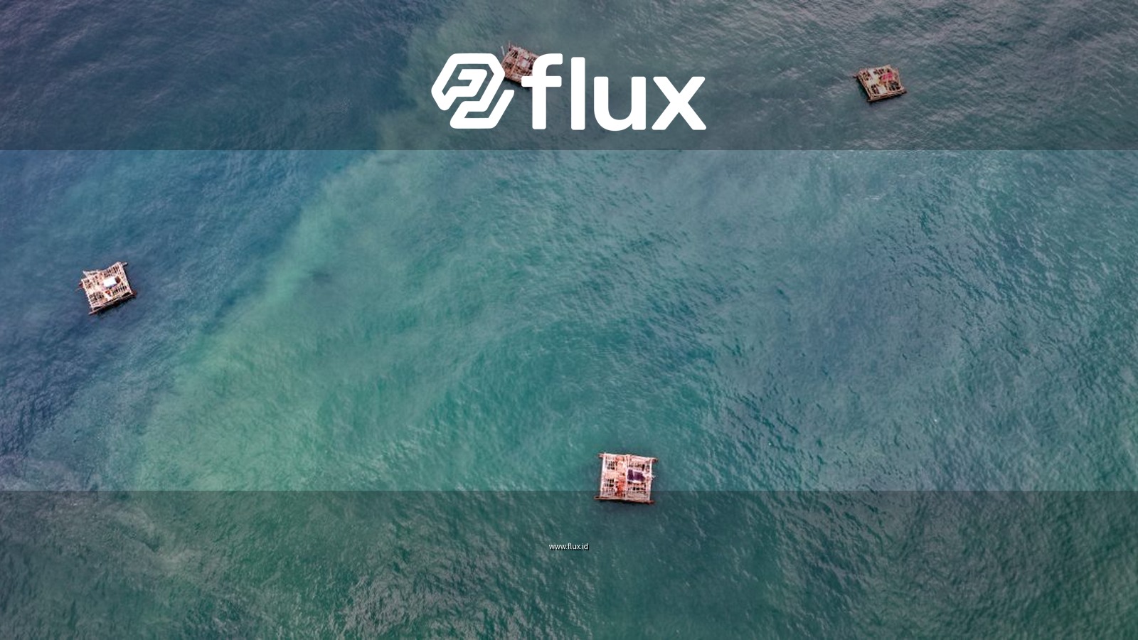 Aerial view showcasing floating rafts in the emerald waters of Pelabuhan Ratu, Indonesia.