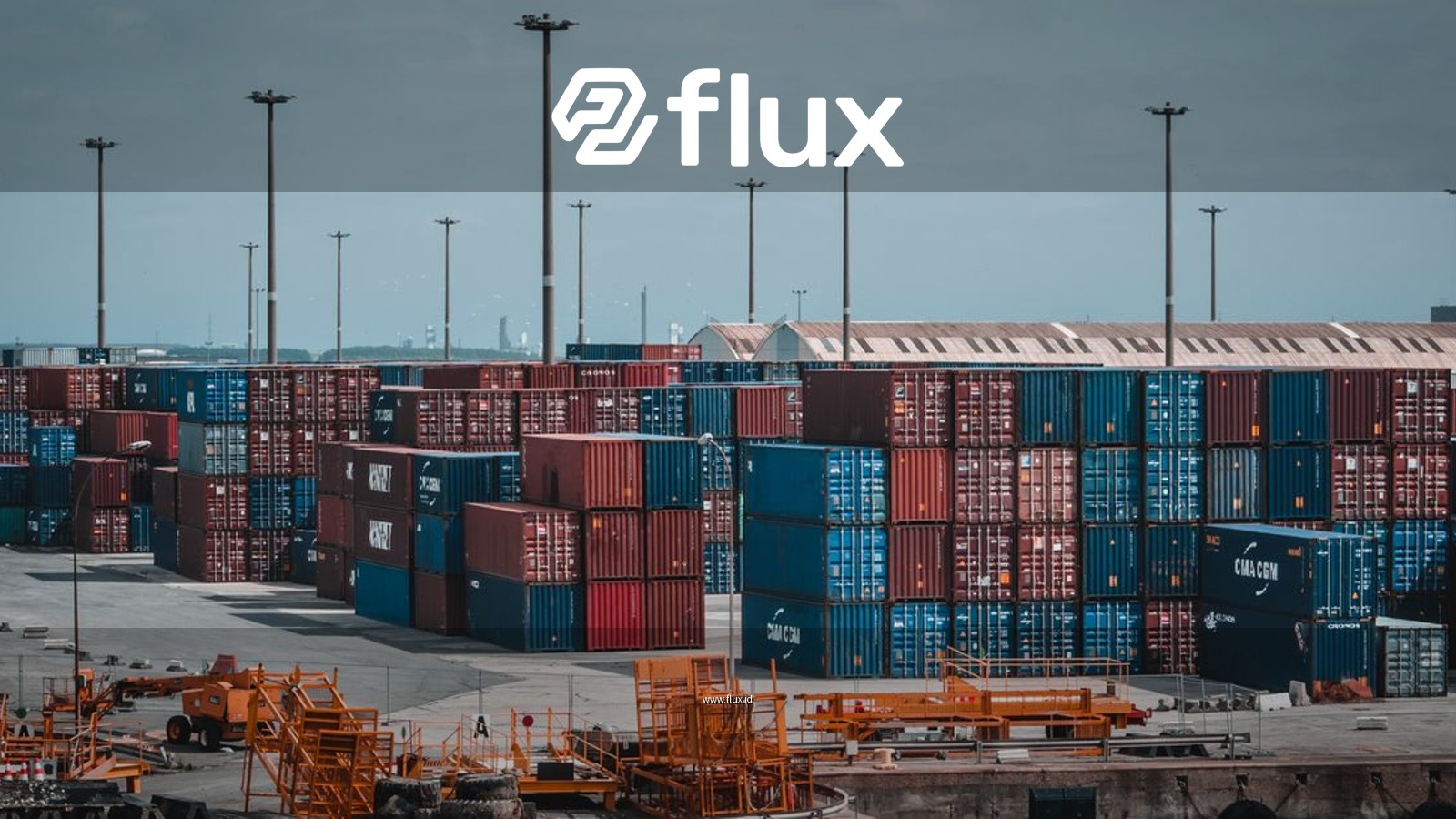 Colorful cargo containers stacked at a busy industrial port, showcasing global trade.