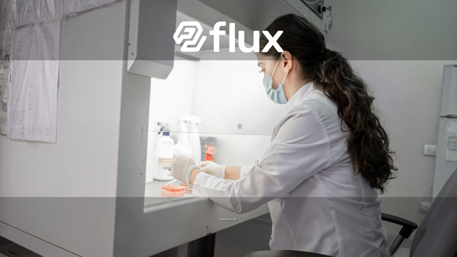 A female scientist wearing a mask works in a laboratory in Baku, Azerbaijan.