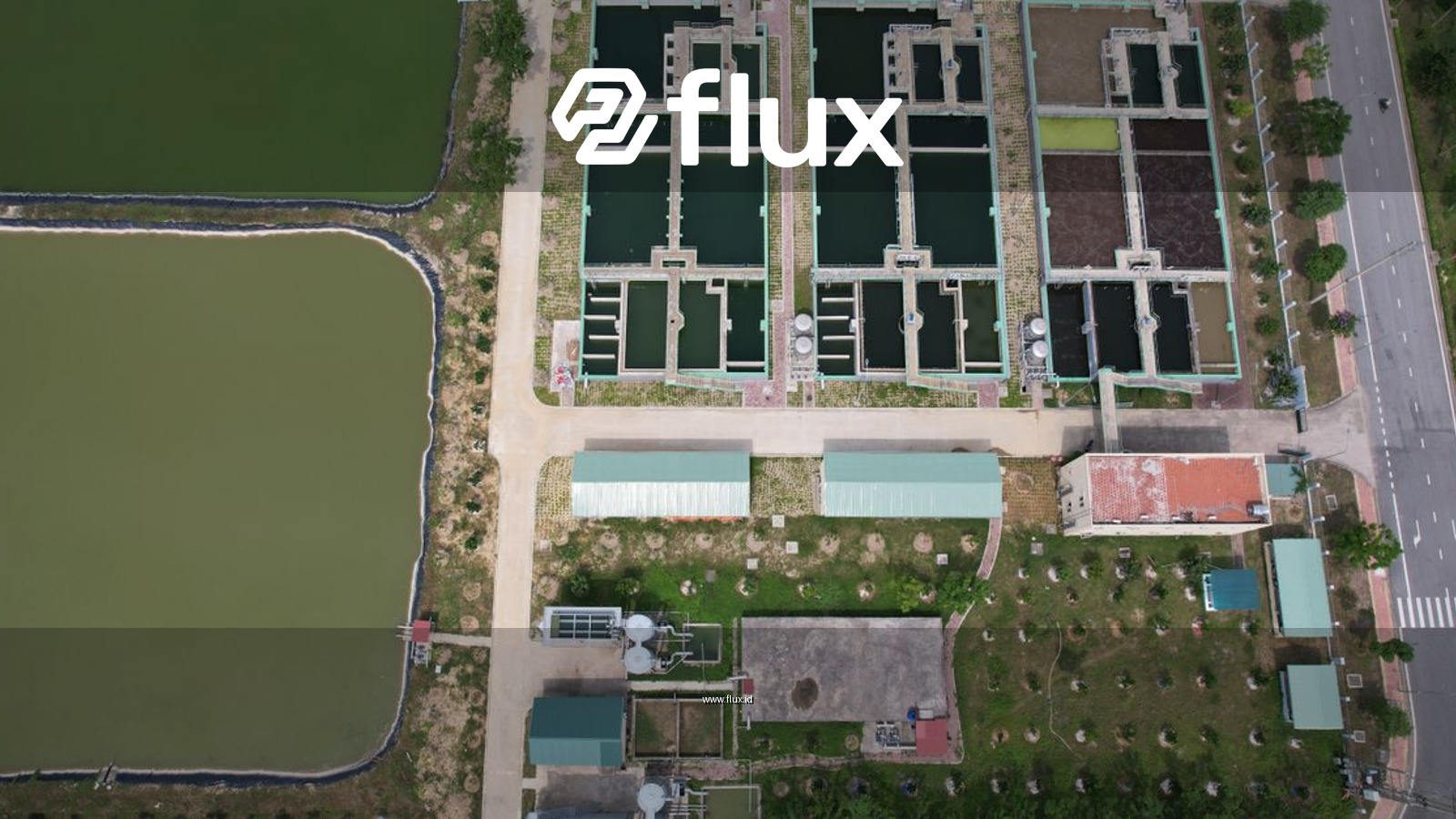 Bird's eye view of a water treatment facility in Hiệp Hòa, Bac Giang, Vietnam showing ponds and infrastructure.