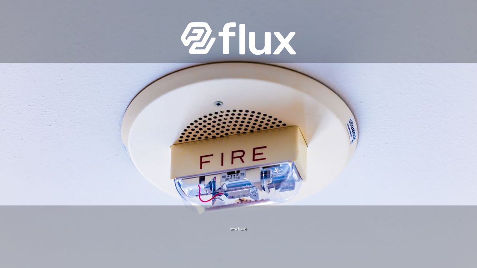 Close-up view of a ceiling-mounted fire alarm system ensuring safety in a building.