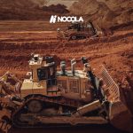 Bulldozers excavating earth in a Brazilian construction site, showcasing industrial power and machinery.