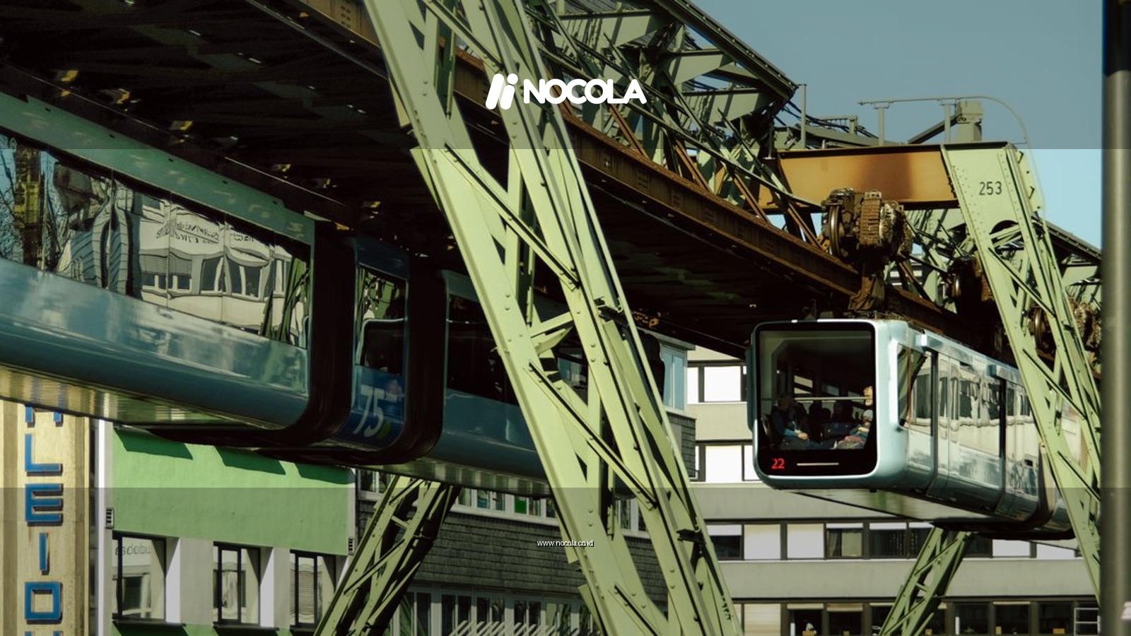 The Wuppertal Schwebebahn glides above the city streets, showcasing unique suspended transit in Germany.