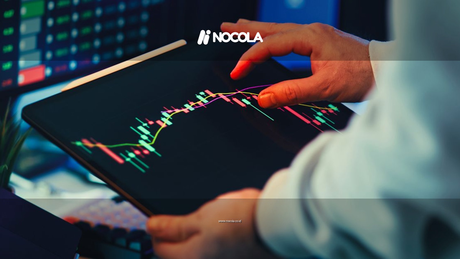 A close-up of a person using a tablet to analyze stock market trends and charts indoors.