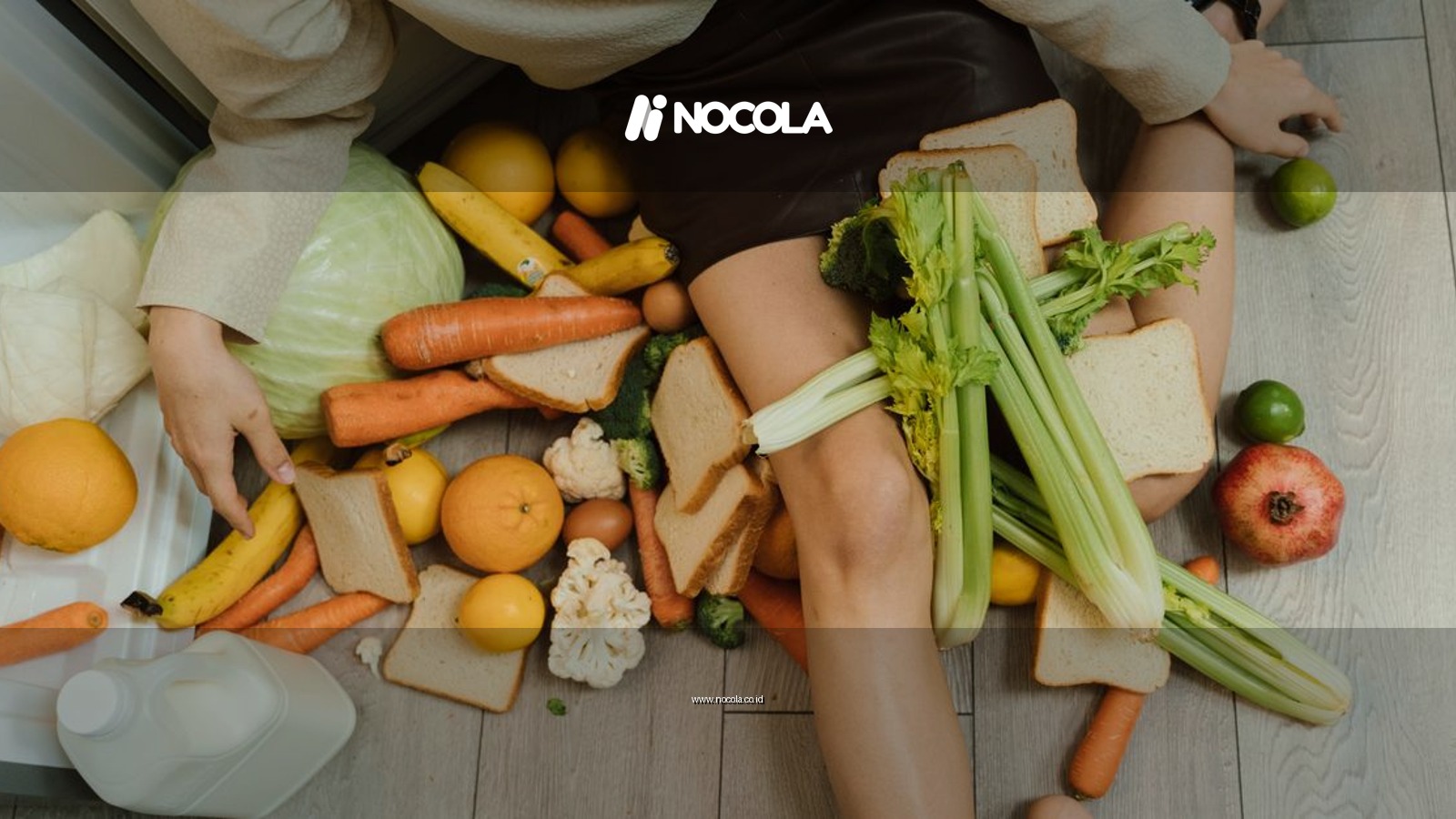 A woman amidst spilled groceries, highlighting food waste and consumerism with vegetables, fruits, and bread.