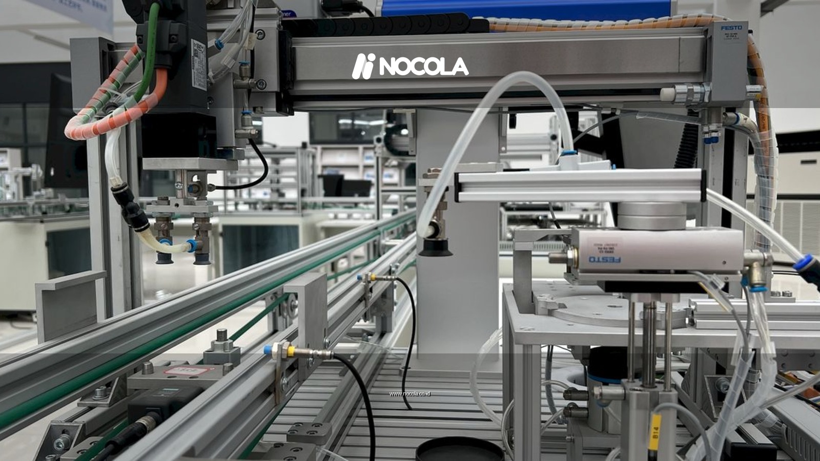 Close-up view of modern automation machinery in an industrial setting.