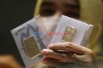 Harga Emas Antam Naik Rp8.000, Kini Dibanderol Rp1.033.000 per Gram