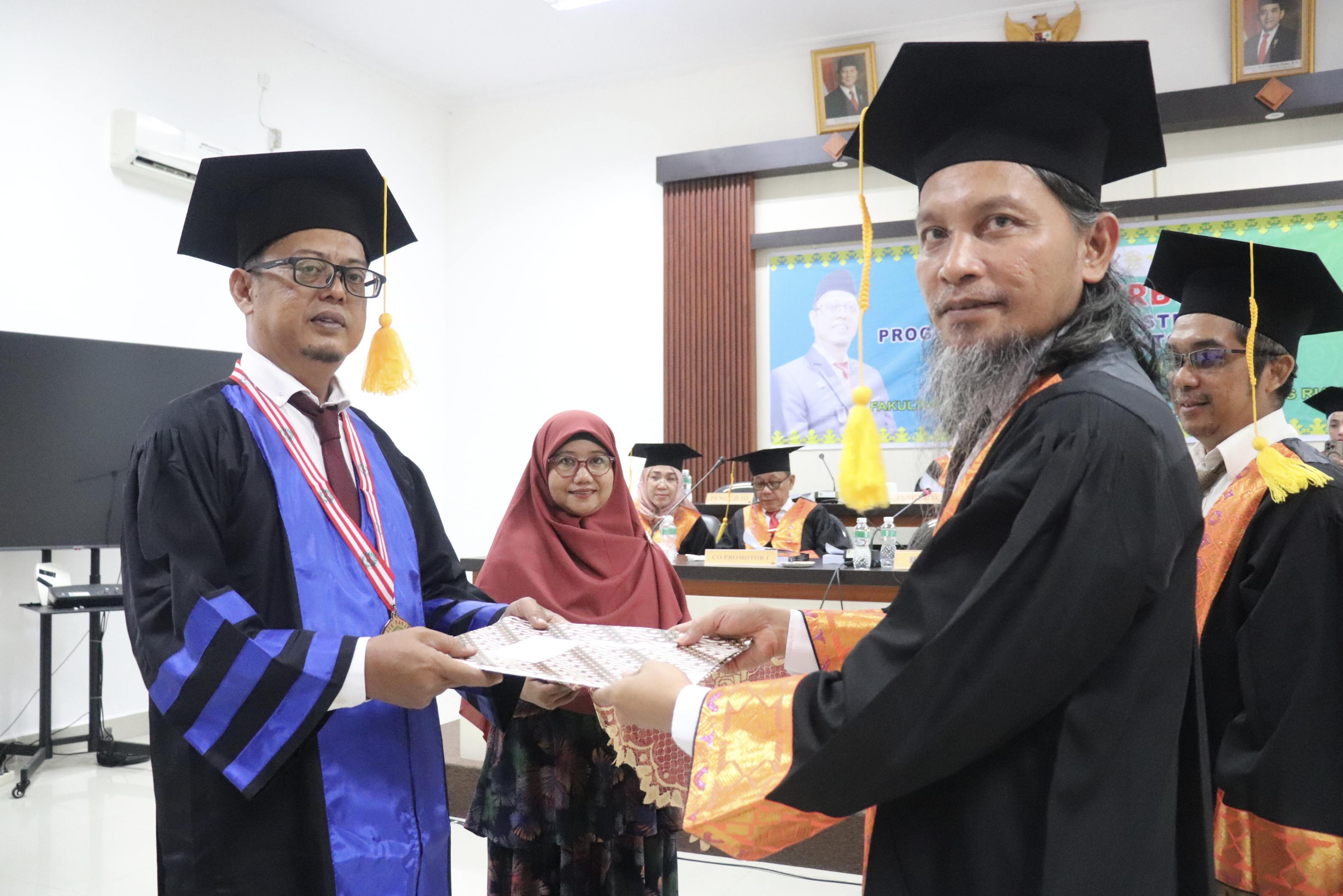 FISIP Universitas Riau Cetak Doktor Administrasi Publik Keempat: Rudy Fadrial Pertahankan Disertasi tentang E-Government