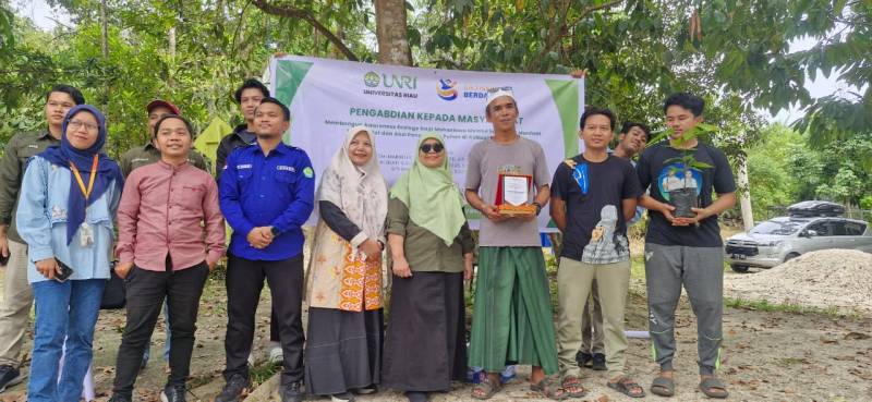 Community Service Activity: Building Ecological Awareness through Indigenous Forest Benefits Socialization and Tree-Planting Actions in Kampar Regency
