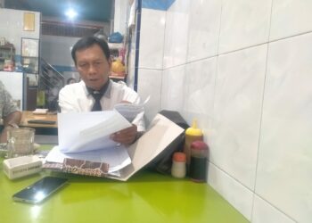 Binaris Situmorang SH