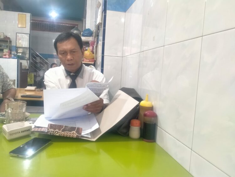 Binaris Situmorang SH